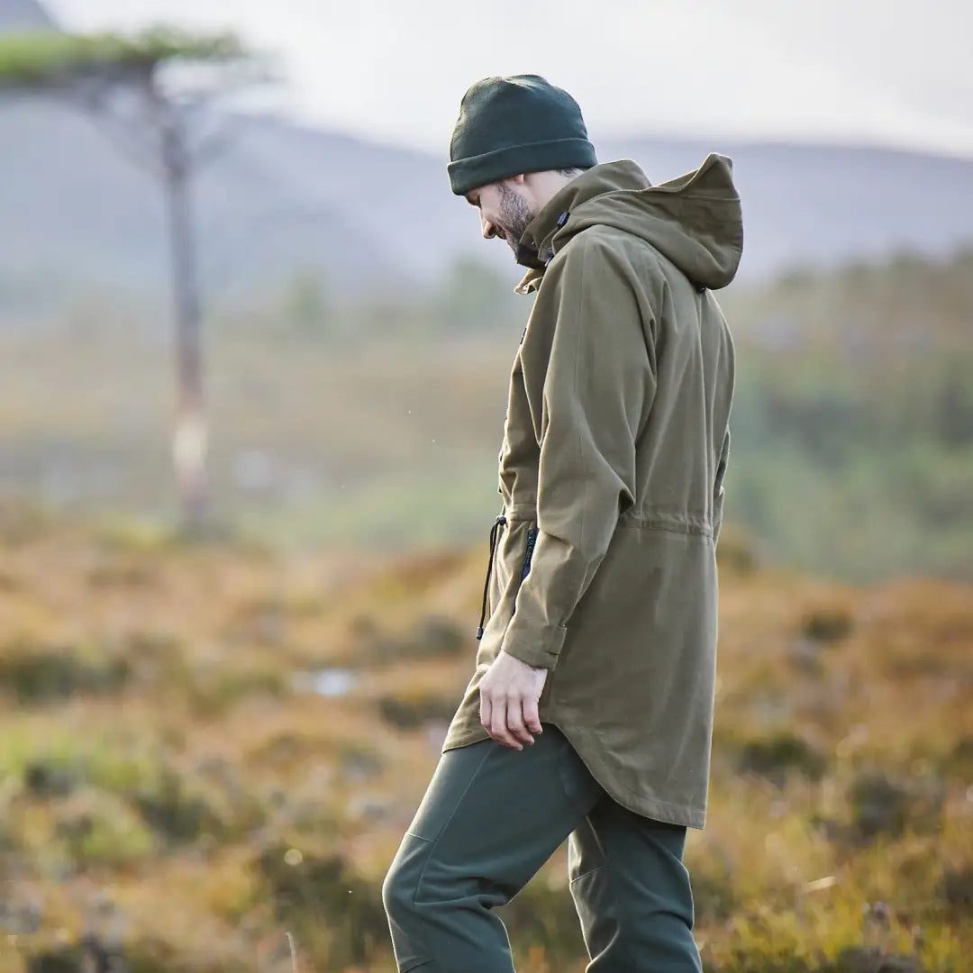 Man in green Ridgeline Monsoon Classic Waterproof Smock enjoys the outdoors