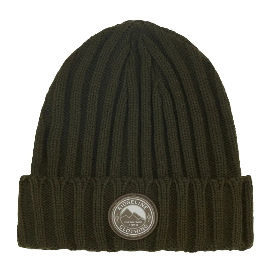 Dark green knitted beanie for country clothing, perfect for hunting adventures