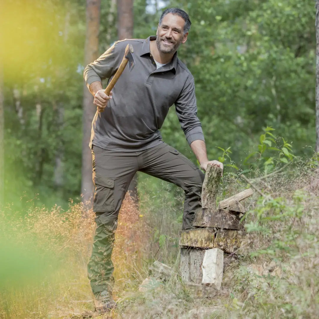 Middle-aged man in a forest rocking a Rovince Bamboo Polo shirt