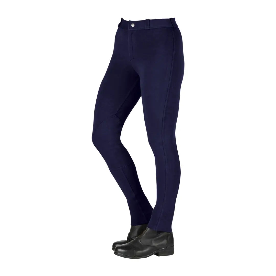 Navy blue Saxon Childs Warm Up Jodhpurs II with sleek black riding boots