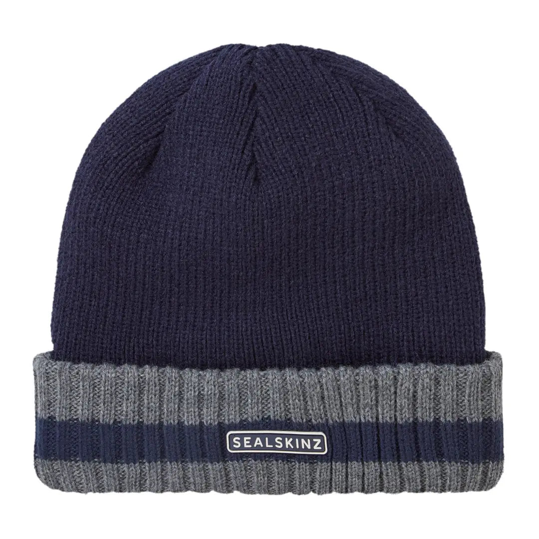 Navy blue knit beanie with a striped brim, perfect for country clothing and outdoors