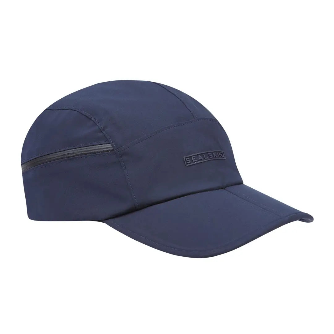 Navy blue Sealskinz Mulbarton cap with zippered pocket and buckle clip closure