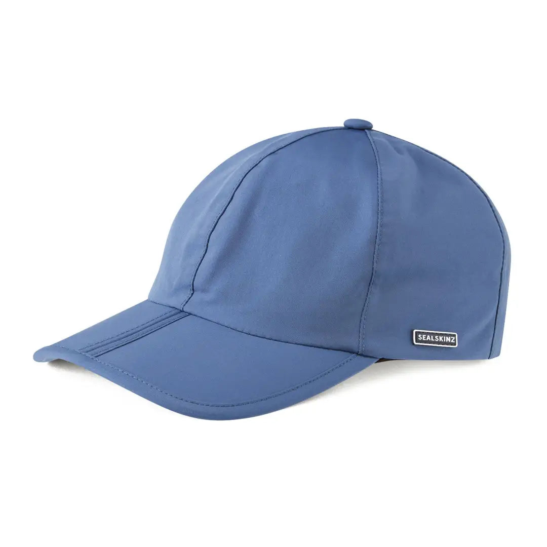 Blue Sealskinz Salle Cap with metal logo, perfect for country clothing and hunting