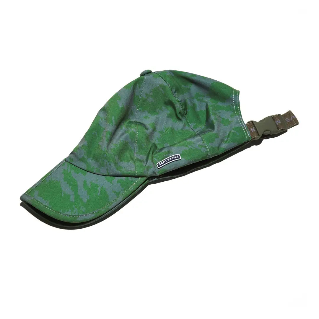 Green camouflage welding cap with adjustable strap, perfect for outdoors and hunting adventures