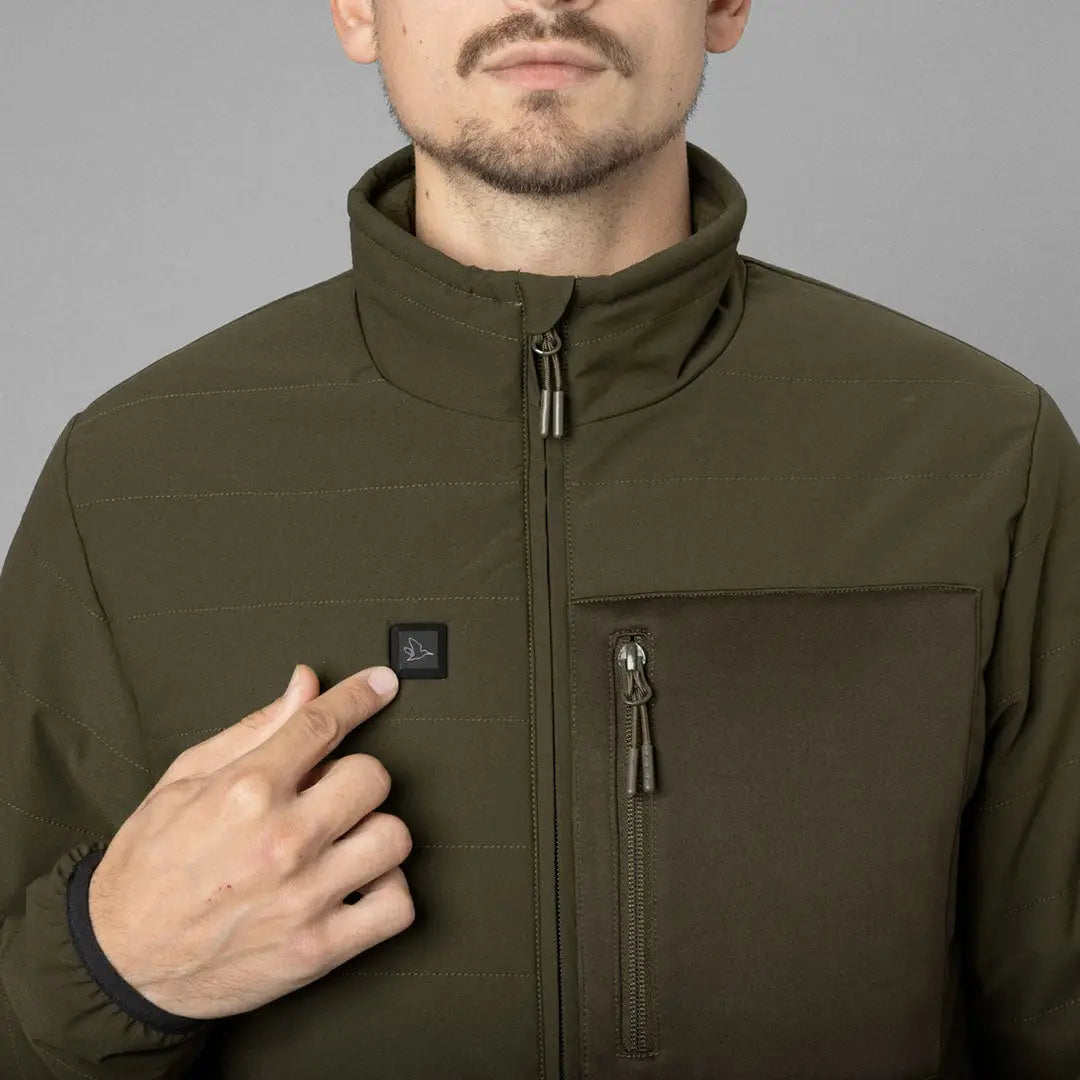 Olive green Seeland Celsius Heat Jacket with a chest pocket and high collar