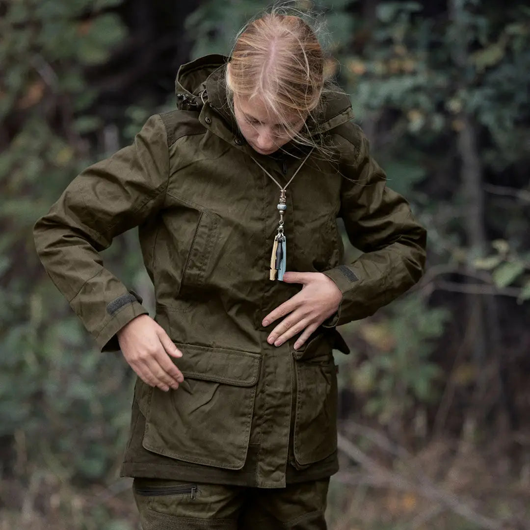 Olive green Seeland Key-Point Kora Jacket with pockets worn by a person with blonde hair