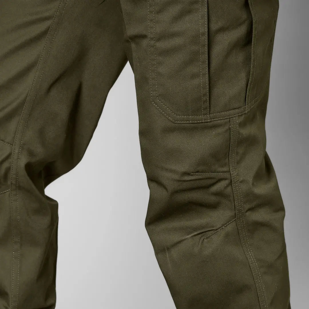 Olive green Seeland Oak Trousers with multiple pockets and seams for a stylish look