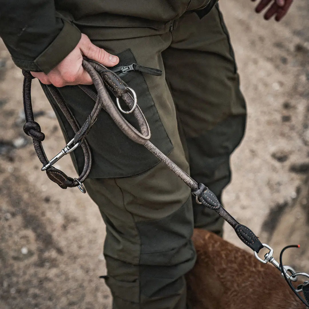 Dog leash with carabiner clip on person wearing Seeland Trax Trousers for hunting