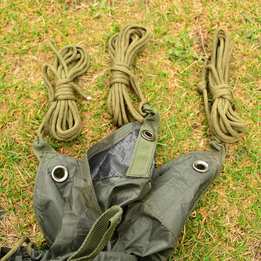 Military-style harness with ropes for Snugpak Stasha G2, perfect for wild camping adventures