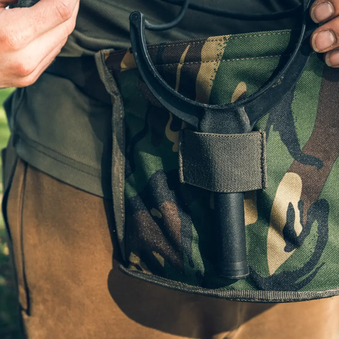 Camouflage holster on a belt for easy access to Speero Boilie Caddy