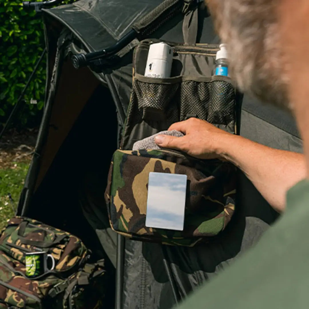 Camouflage tactical vest from the Speero Folding Wash Kit with pockets and attachments