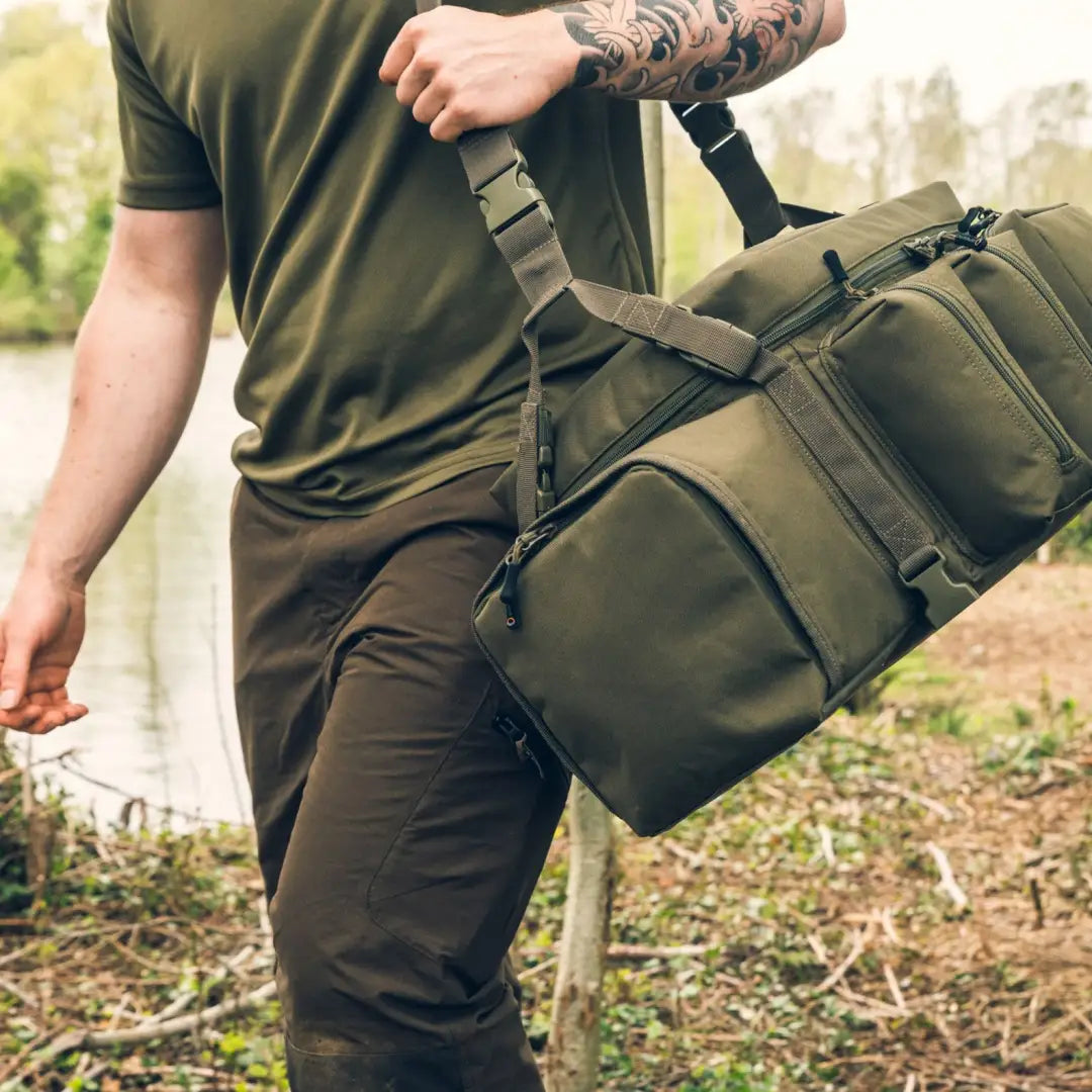 Olive green Speero Modular Carryall duffel bag with multiple straps and compartments