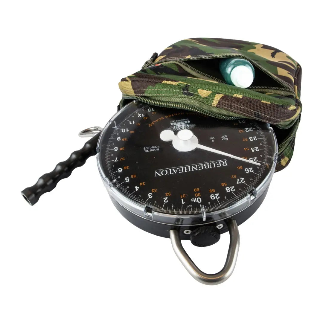 Circular fishing scale with a camouflage-printed Speero Scales Pouch for easy storage