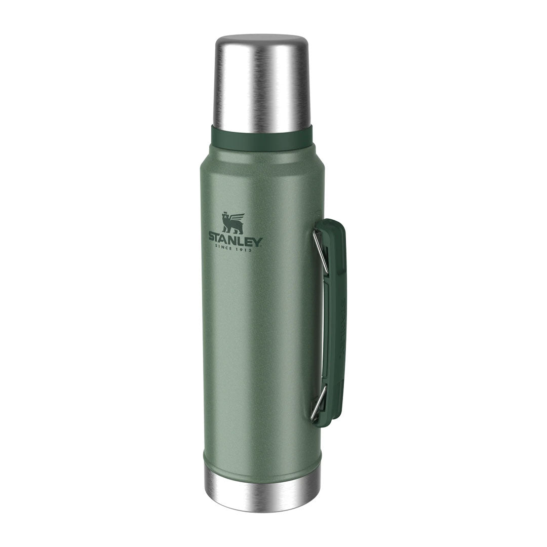 Green Stanley thermos with handle, perfect for country clothing, hunting, and outdoors adventures