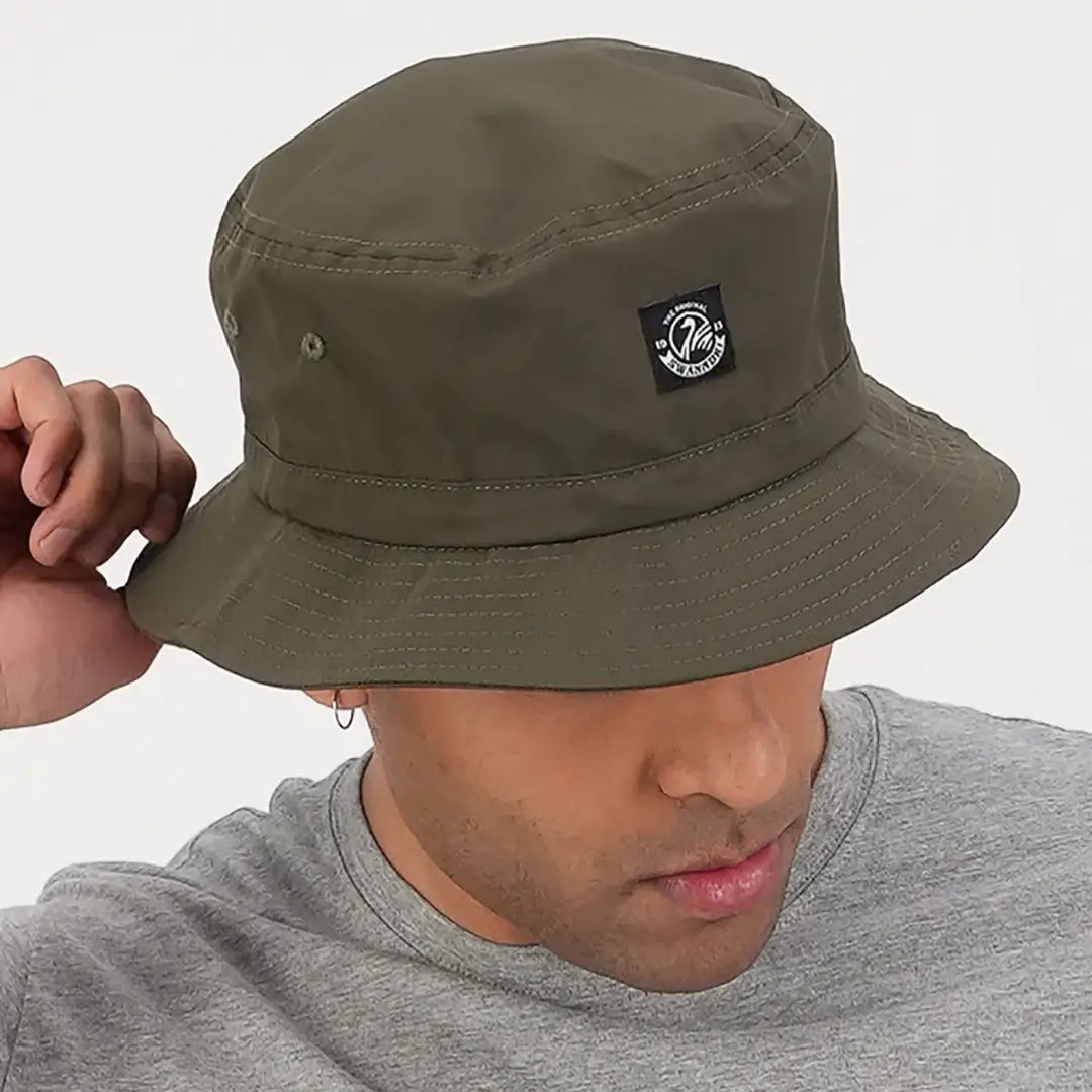 Olive green bucket hat with logo patch perfect for country clothing and hunting adventures