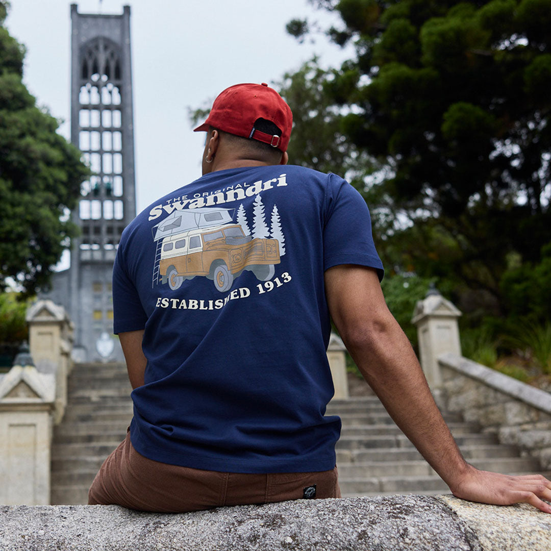 Navy printed t shirt featuring a camper van graphic in exclusive seasonal designs