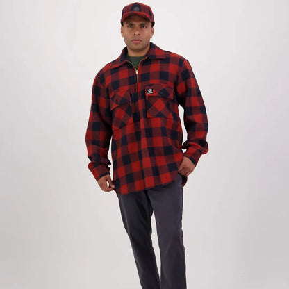 Man in a red and black plaid flannel wearing a Swanndri Ranger Bush Shirt