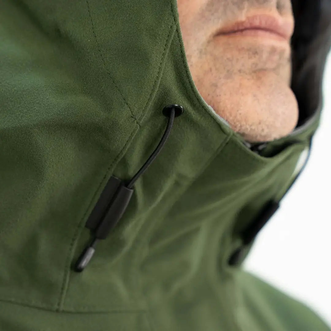 Green hooded Swazi Tahr XP Smock with drawstring, perfect for wet weather adventures