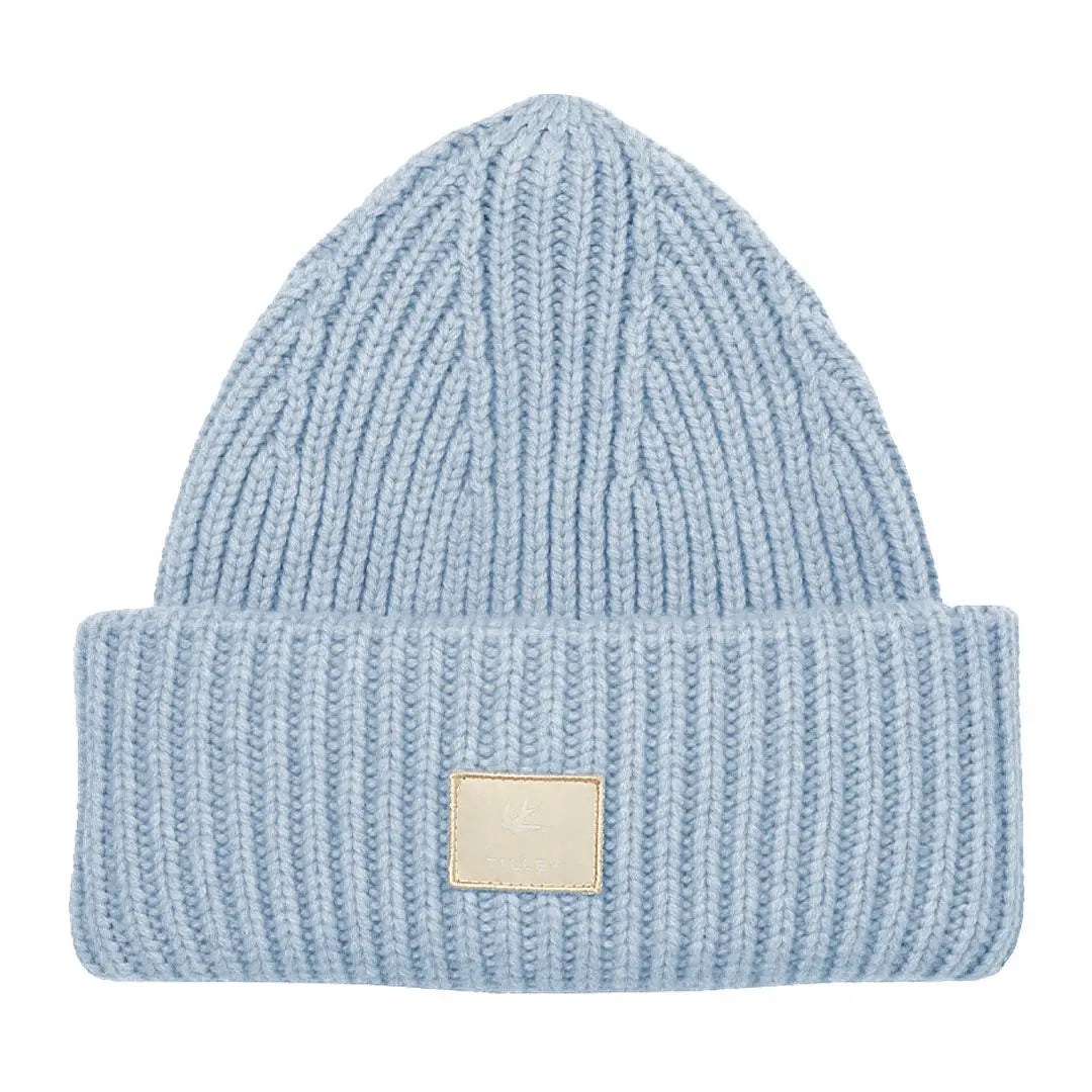 Light blue Tilley Alpine Beanie with a square label on the cozy folded brim