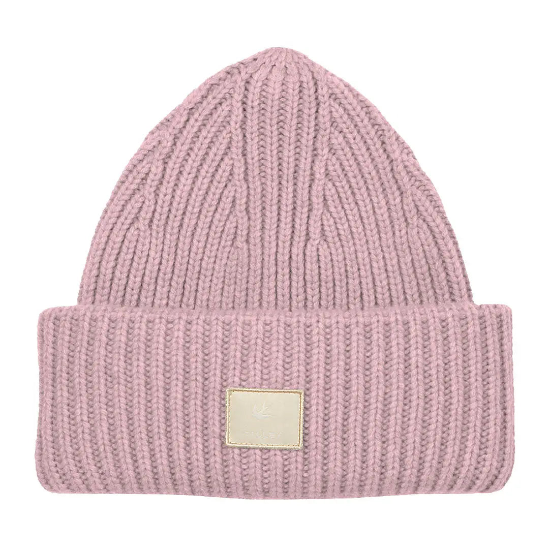 Pink knitted Tilley Alpine Beanie featuring a stylish small rectangular label