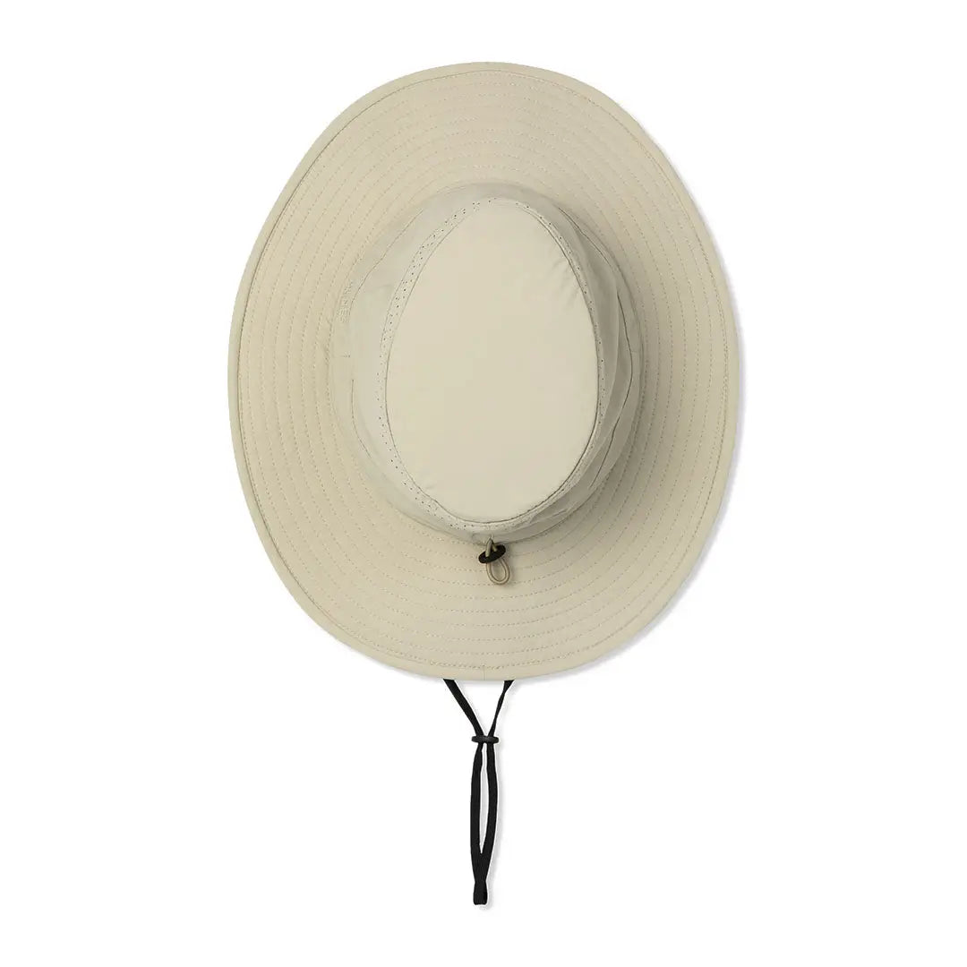 Cream-colored Tilley Dunes Drifter Hat with wide brim and chin strap for sun protection