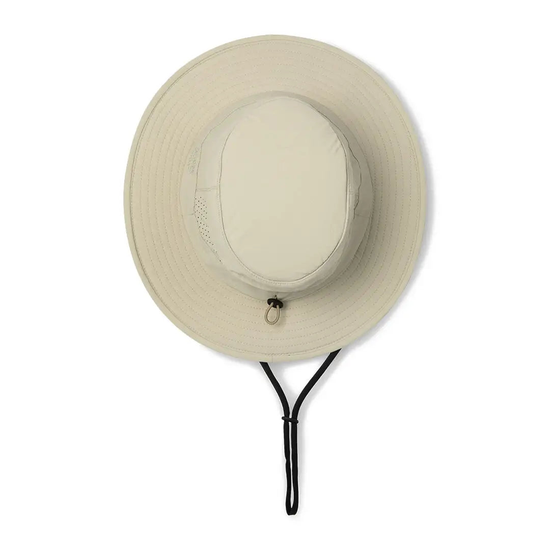 Cream-colored Tilley Dunes Explorer hat with a stylish black chin strap