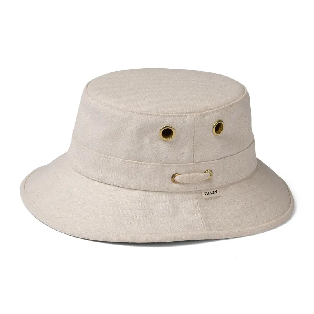 Beige bucket hat with grommets and chin strap, Tilley Iconic T1, durable water repellent