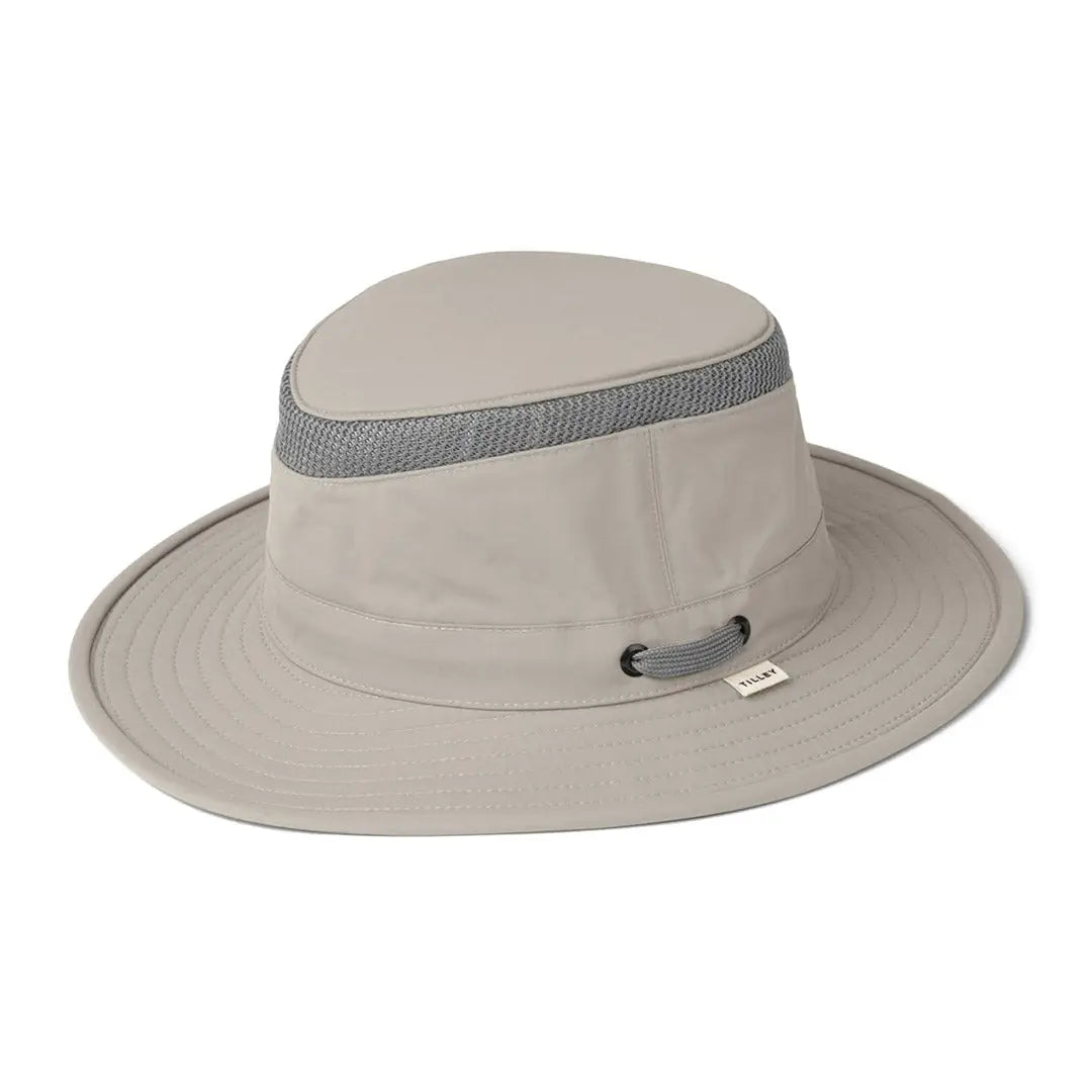 Beige Tilley Airflo Hat with a gray hatband, perfect for sunny days