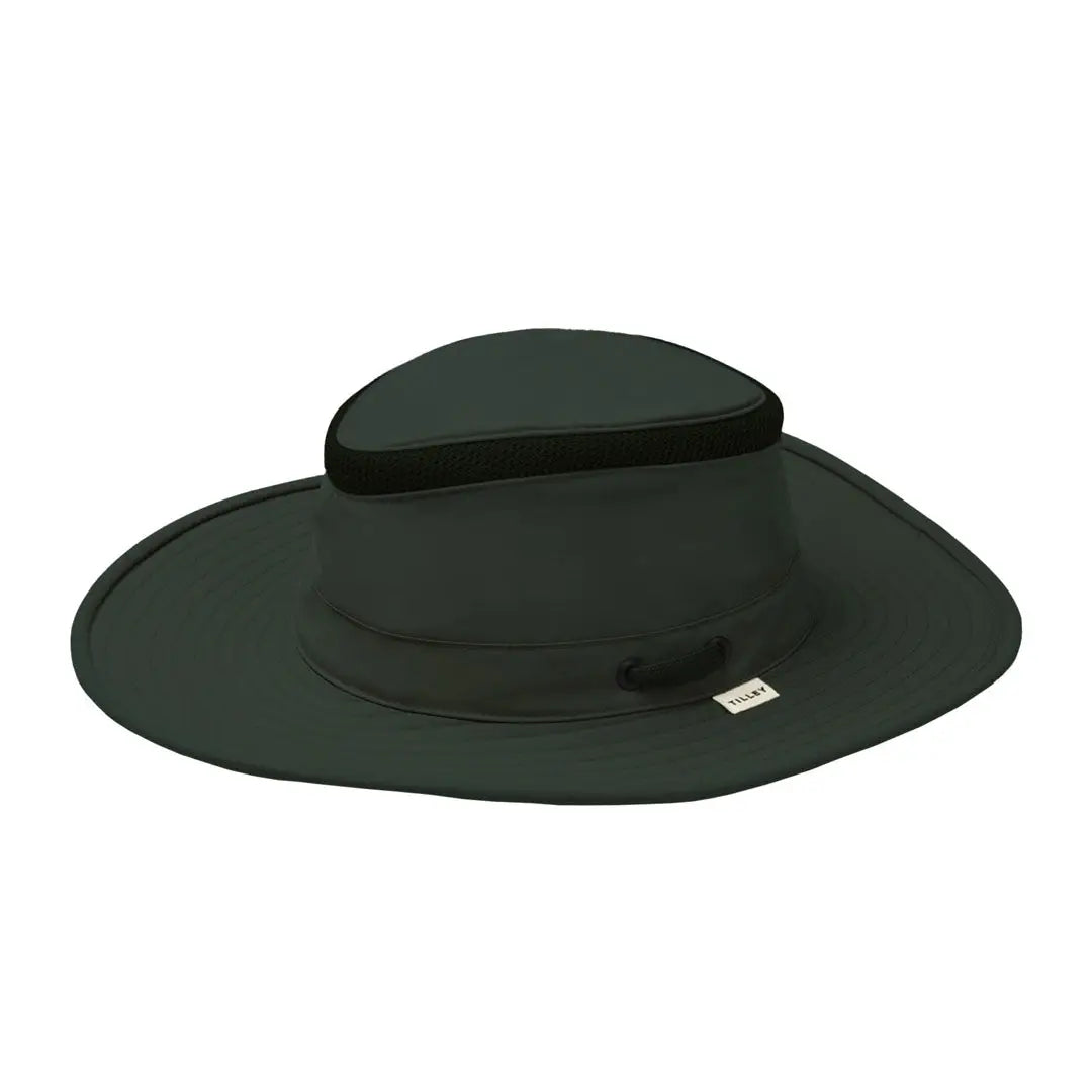 Wide-brimmed black Tilley LTM6 Airflo Hat with flat crown and decorative band