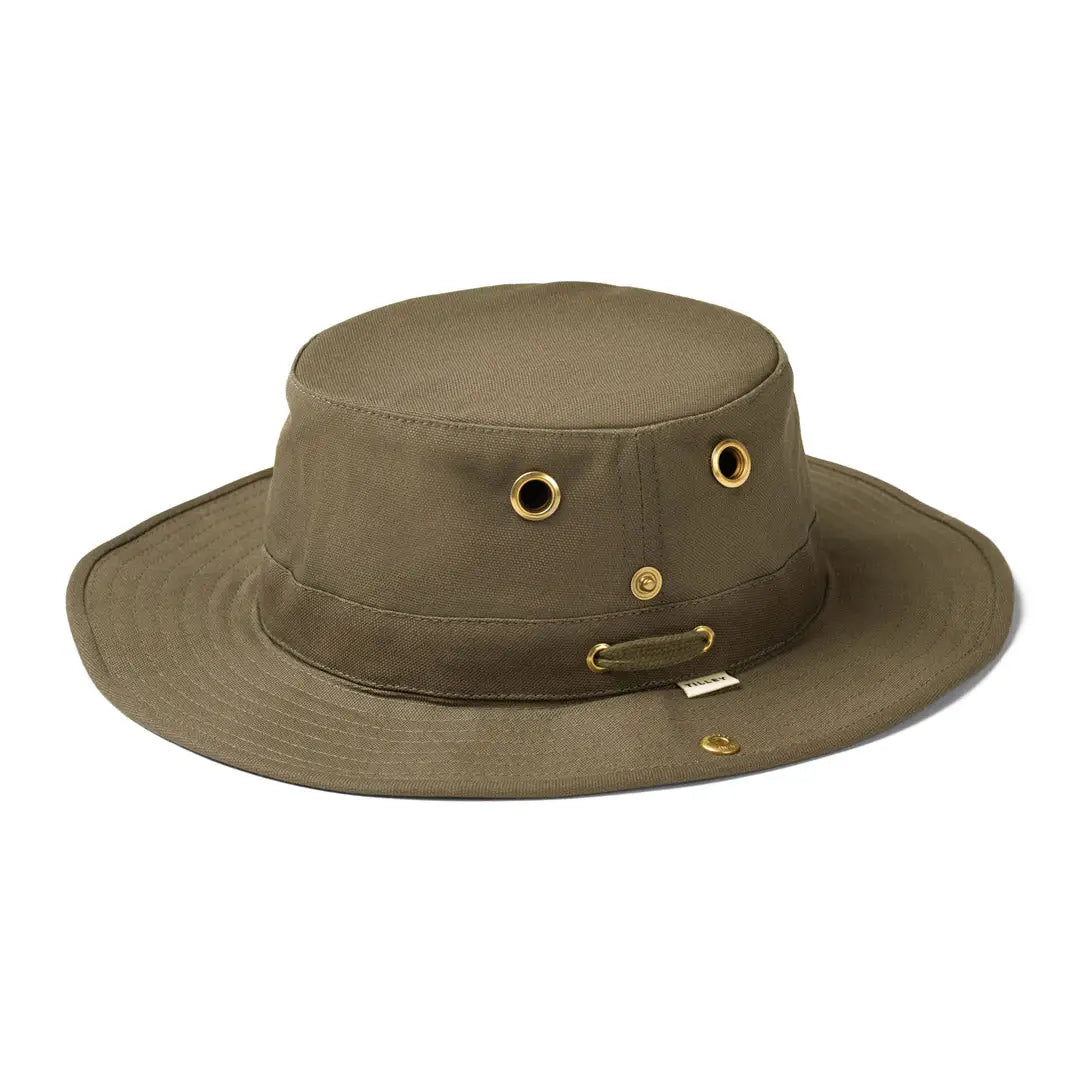 Olive green Tilley TH5 Hemp Hat with sloped brim design, brass eyelets, and chin strap