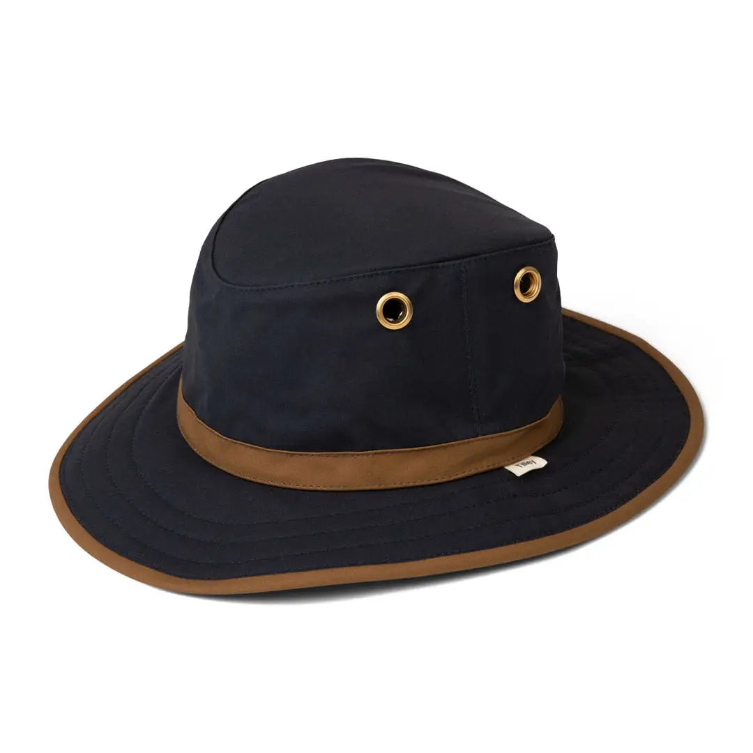 Black Tilley TWC7 Outback Waxed Cotton Hat with a brown band and metal grommets