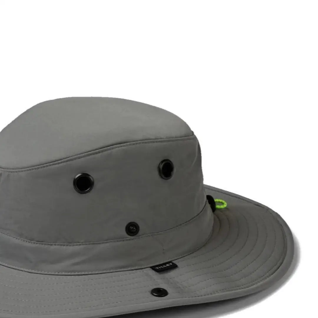 Gray Tilley TWS1 All Weather Hat offers sun protection with ventilation holes and a green accent