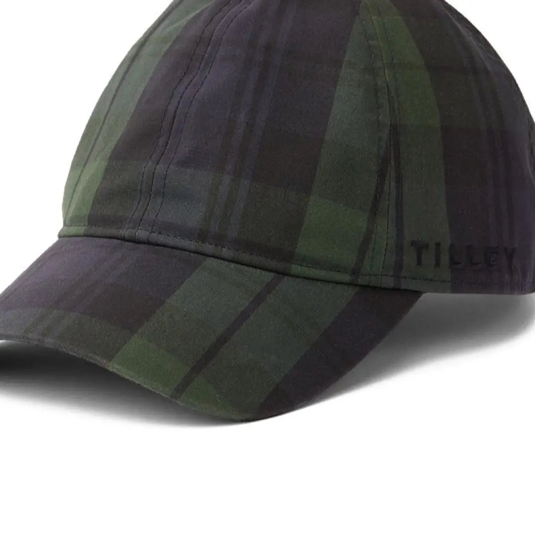 Plaid Tilley Waxed Baseball Cap in dark green and black colors, stylish and durable