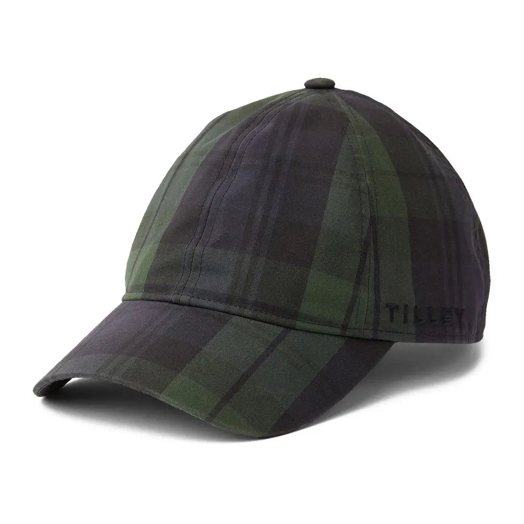 Camouflage Tilley Waxed Baseball Cap with a curved brim for stylish outdoor adventures