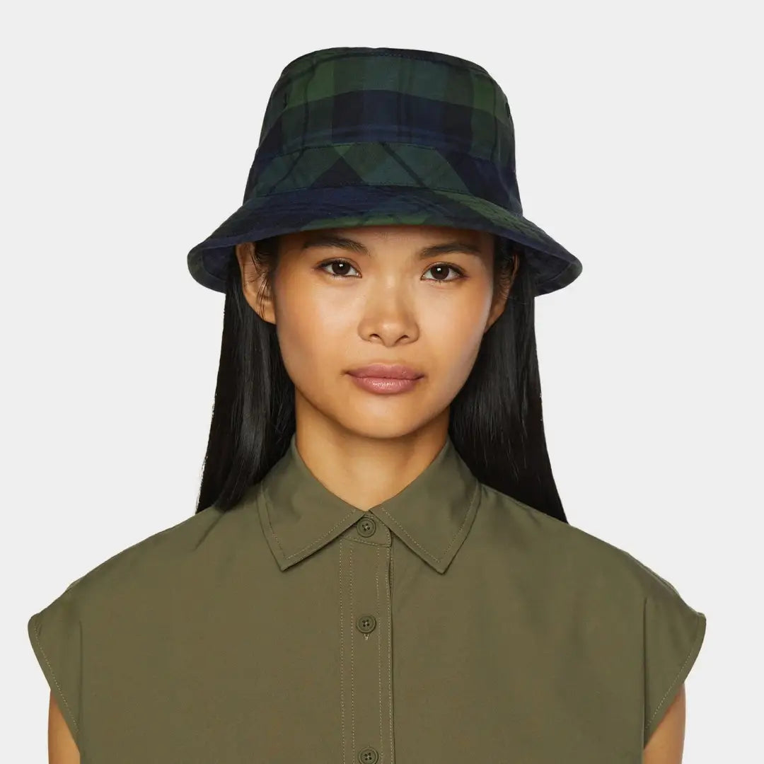 Dark green and navy blue plaid bucket hat made from British Millerain waxed cotton