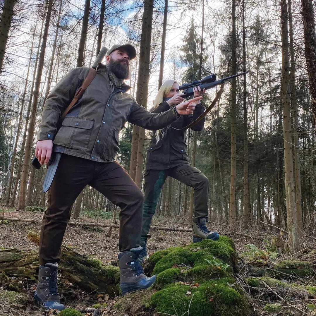 Two people in Verney Carron gear showing off the Fox Original Jacket in a forest