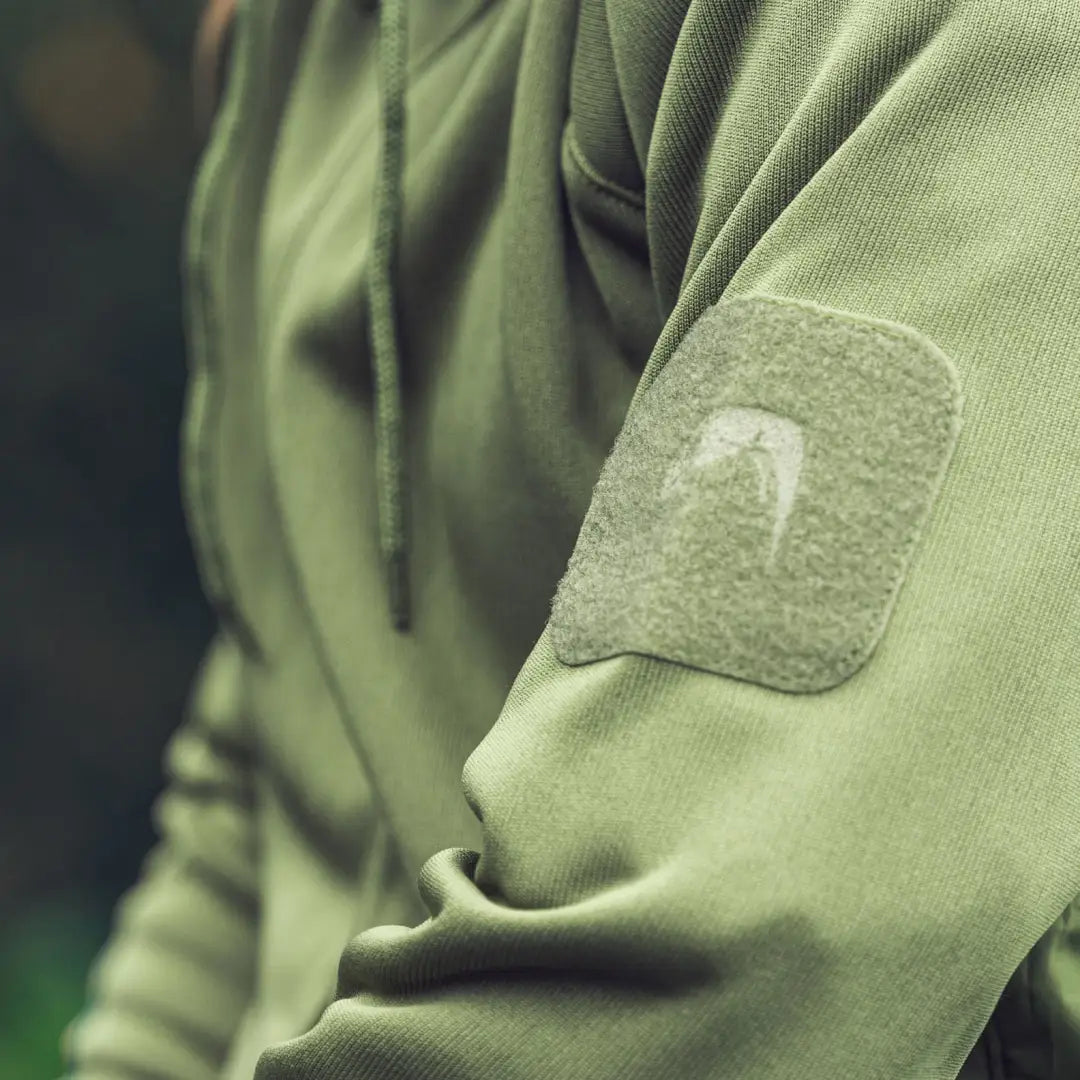 Military-style jacket sleeve with Nike swoosh on Viper Storm Hoodie, featuring brushed fleece lining